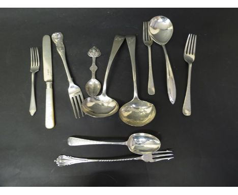 A quantity of mixed silver cutlery including sauce ladles, dessert fork etc, 328g including mother of pearl 