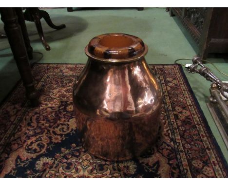 A Victorian copper churn converted into a stick/umbrella stand