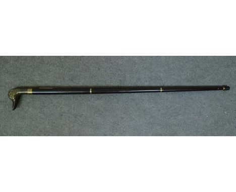 An ebony walking stick with brass ducks head handle, the handle unscrews to reveal a spirit test tube 