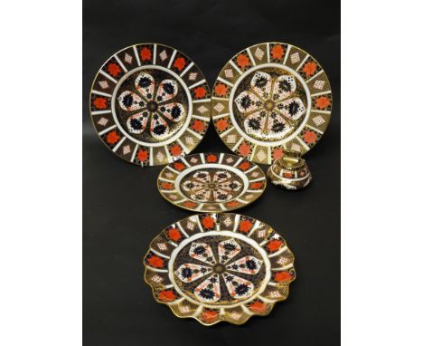 Four Royal Crown Derby plates and a lighter 