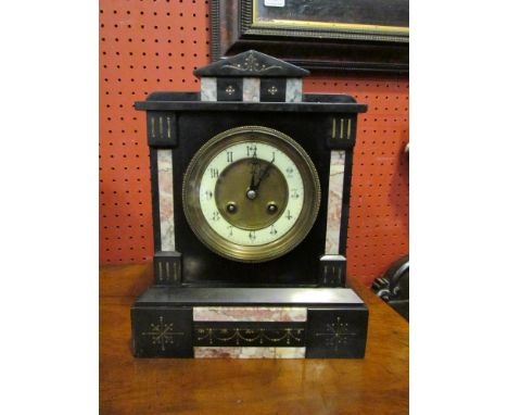 An early 20th Century black slate mantel clock (with key) 