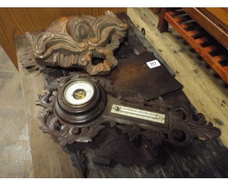 Barometer in carved case, wall bracket, letter rack and a plaque 