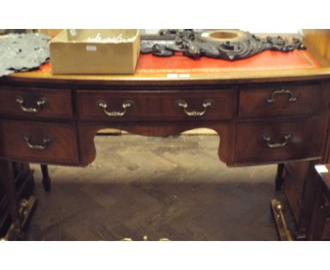 4' reproduction mahogany bow front kneehole desk with red leather top, fitted 5 drawers and an Ercol dining chair