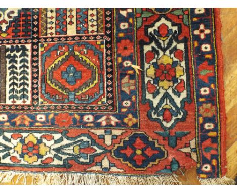 Red patterned Bakhtiari Persian rug (6' 6" x 5' 3")