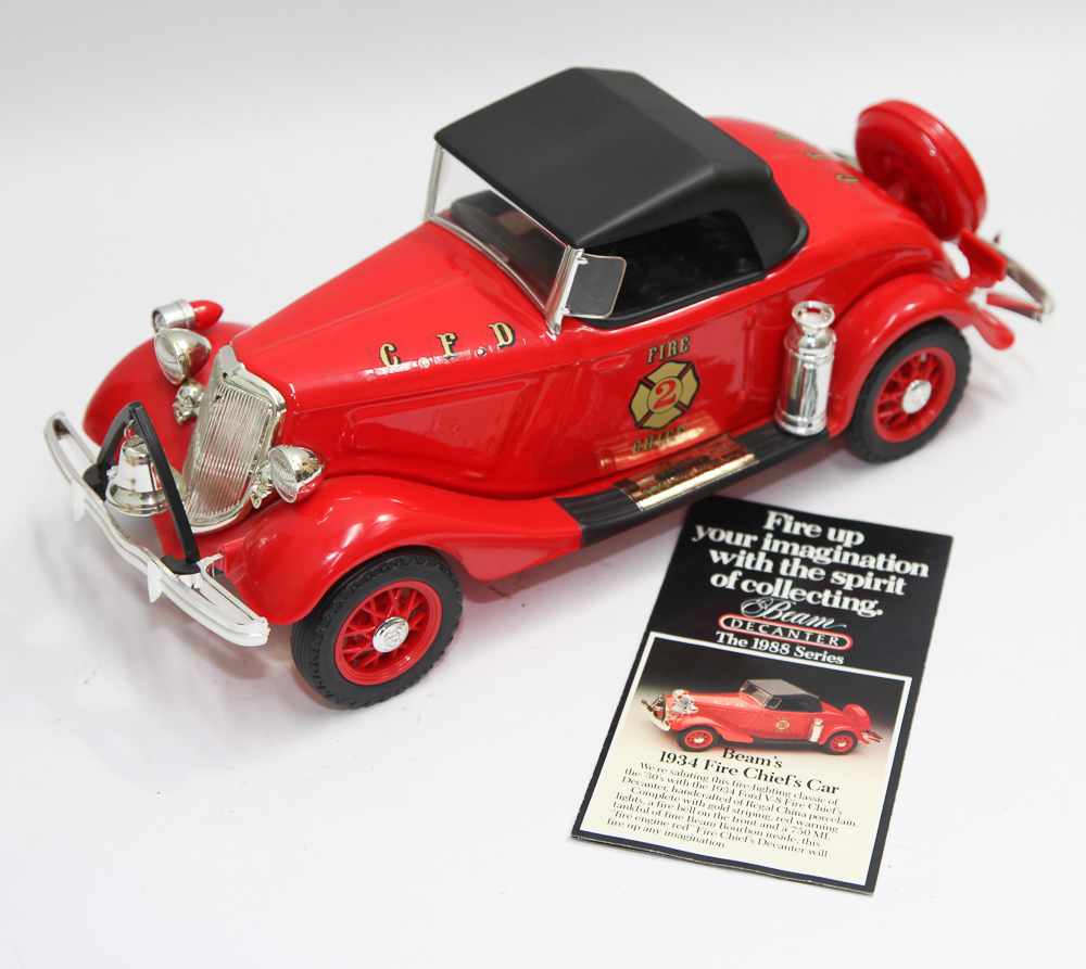 Jim Beam Bourbon porcelain spirit decanter modelled as a 1934 fire chief Ford V8 complete with or