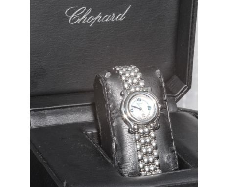 Chopard ladies stainless steel & diamond Happy Sport wristwatch, the case set with five cabochon sapphires, and five free mov