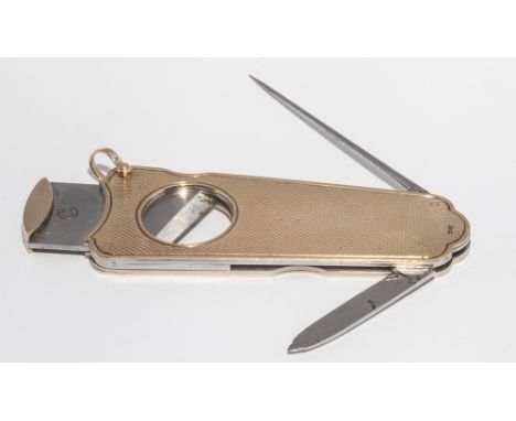 9ct engine turned cigar cutter.with guillotine action and knife in the side, with suspension loop