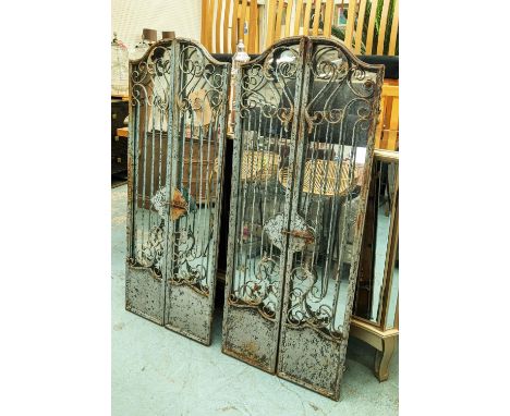 ARCHITECTURAL WALL MIRRORS, a pair, each 53cm x 130cm H, behind a pair, gated design. (2) 