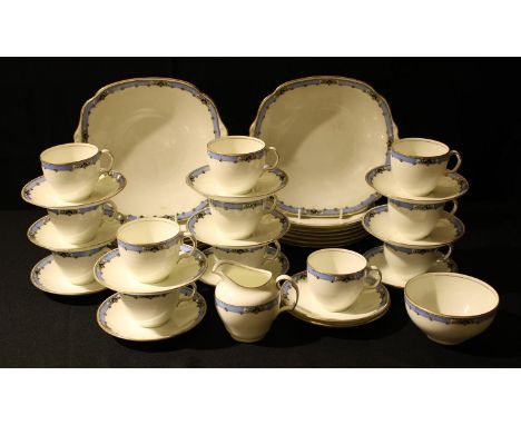 A Cauldon China part tea service comprising cake plates, side plates, cream jug, sugar bowl, cups and saucers 