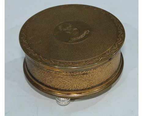 An interesting gilt brass powder pot and cover, engine turned, engraved with the motto, Quis Nos Seperabit below a shield cre