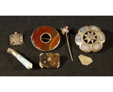 A Scottish silver mounted agate brooch, 5cm diam; others; a Scottish hardstone stick pin; a pendant; a Maltese cross fob or p