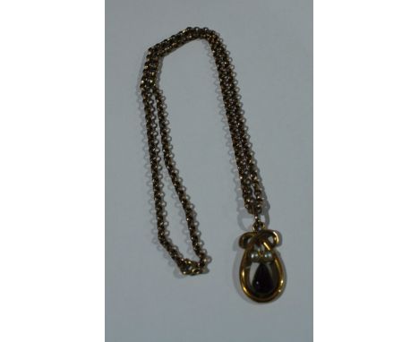 A gold plated pendant necklace, the oval droplet set with a pear cut amethyst and seed pearls, late 19th century 