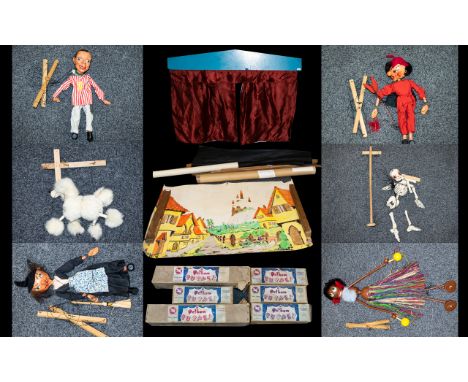 Pelham Puppets and Stage. A collection of six boxed 1950's Pelham puppets to include The Devil, The Witch, A Poodle, Lulabell