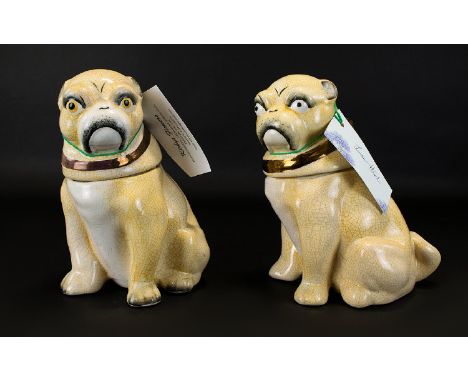 A Late 19th Century Quality Ceramic Pair Of German Pug Dog Figurative Jars Comprising removable heads each with yellow and br