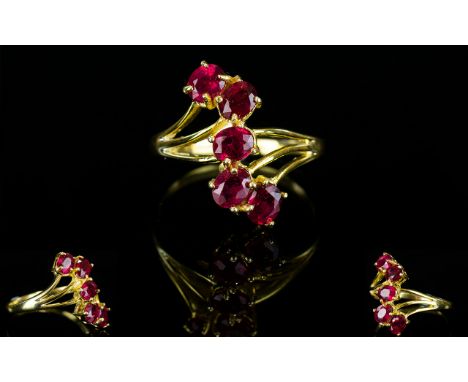 Ruby Five Stone Ring, a trail of five oval cut rubies, totalling 2.75cts, running across the top of a 14ct gold vermeil and s