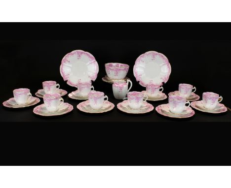 The Foley China Part Tea Set, comprising ten cups, twelve saucers, twelve side dishes, one large sugar bowl, two sandwich/fru