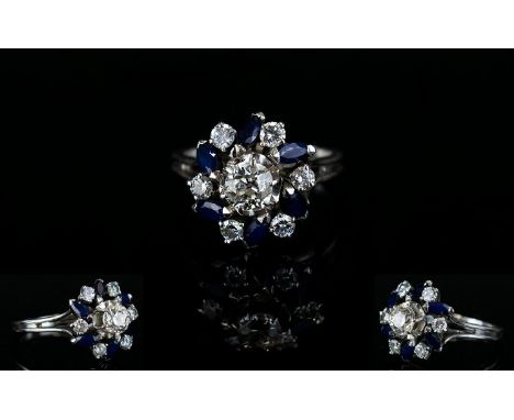 18ct White Gold Diamond and Sapphire Dress Ring, In a Flower head Design Setting. The Diamonds and Sapphires of Good Colour /