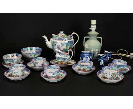 English Chinoiserie Tea Set, comprising one tea pot, milk jug, sugar bowl, slop bowl, 6 tea bowls and saucers plus 1 spare sa