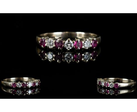 18ct Gold - Attractive Diamond and Ruby Set Dress Ring. The Diamonds and Rubies of Good Colour and Clarity. Fully Hallmarked.