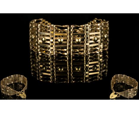 9ct Gold - Attractive 1970's 8 Bar Gate Bracelet with Attached 9ct Gold Heart Shaped Padlock and Safety Chain. Fully Hallmark