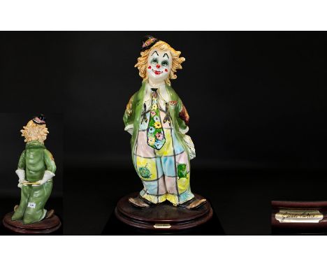 Capodimonte Large Hand Painted Ceramic Clown Figure by Guiolo Cortese, Raised on a Circular Wooden Base. Stands 20 Inches 55 