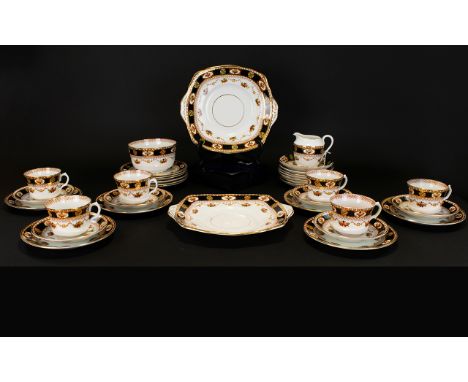 Roslyn China R&C England Part Tea Set. Two sandwich/fruit plates, four cups with saucers, twelve side plates, one milk jug an