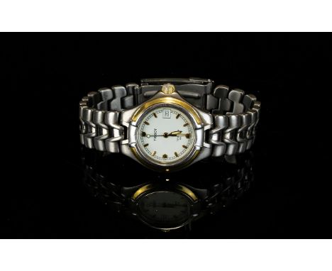 Tissot Titanium T640 Lady Diver 20 ATM Wrist Watch Gold bezel and numerals with cream dial and signature impressed 'T' logo t