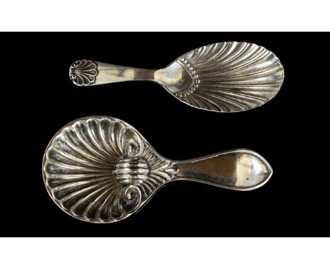 Hallmarked Silver Caddy Spoon In The Regency Style With Fluted Bowl And Shell Terminal. Hallmarked For Sheffield e 1922. Toge