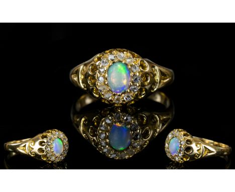 Antique Period 18ct Gold Opal and Diamond Gallery Set Dress Ring. The Central Opal Surrounded by 14 Old Cut Diamonds. 18ct Go