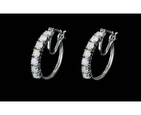 Australian Coober Pedy Opal Hoop Earrings, a close set row of round cut opals to the front of each platinum vermeil and silve