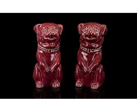 Victorian Period Pair Of Handpainted Ceramic Maroon Pug Dog Figures Fashioned in sitting position, both in good condition and