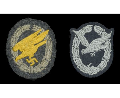 Luftwaffe Cloth Badges. Two examples, the first an Air Gunner’s other ranks Badge. Luftwaffe blue felt, with machine-embroide