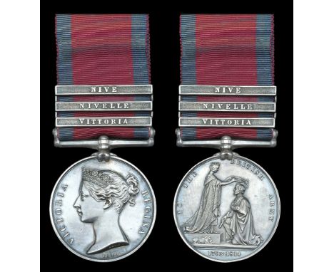 The Peninsula War medal awarded to Captain E. Wolfe, 28th Foot, a descendant of General Wolfe of Quebec, who was severely wou