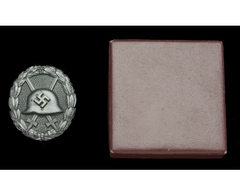 A M.1936 Spanish Civil War Wound Badge in Black in Presentation Case. An exceptional quality example, retaining almost all or