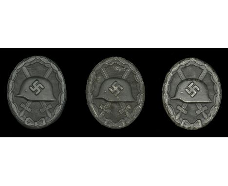 1939 Black Wound Badges. Three examples, the first by Wilhelm Deumer. Very good quality example in mint condition, retaining 