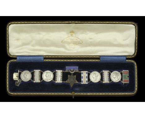 An unusual group of five miniature dress medals, in the form of a bracelet, attributed to Colonel C. J. R. Rayment, Army Vete