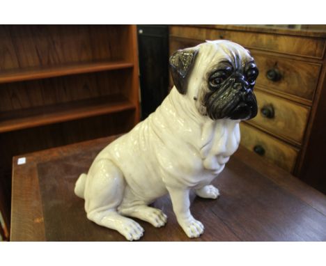 Ceramic pug statue