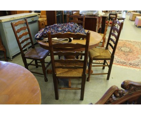 4 oak ladder-back chairs