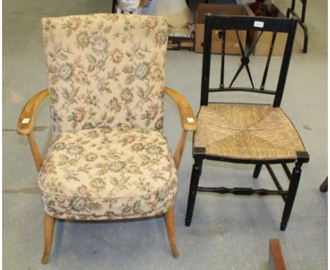 Ercol light armchair and ebonised chair
