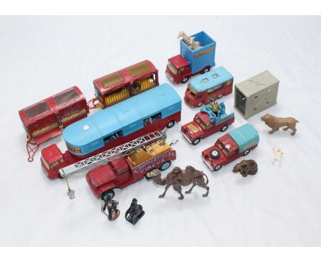 A collection of unboxed Corgi Chipperfields Circus models including: Horse Transporter with 2 horses & 1 rider, Giraffe Trans