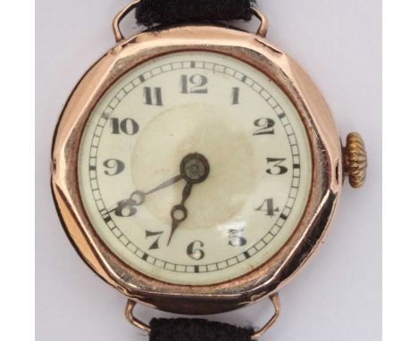 A Victorian ladies 9ct gold cocktail watch, the cream dial with Arabic numerals denoting hours, housed in a Dennison case and
