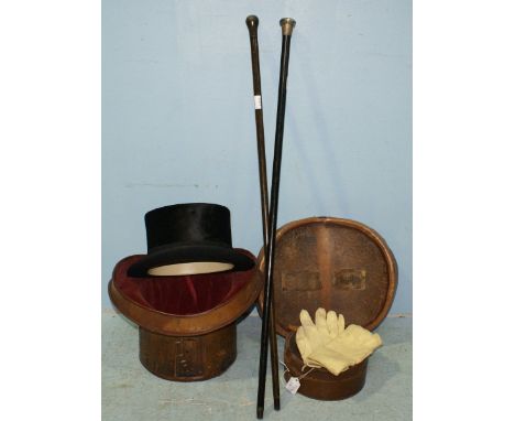 A Moss Bros top hat in vintage brown leather protective case, together with a brown leather collar box and collars, pair of k