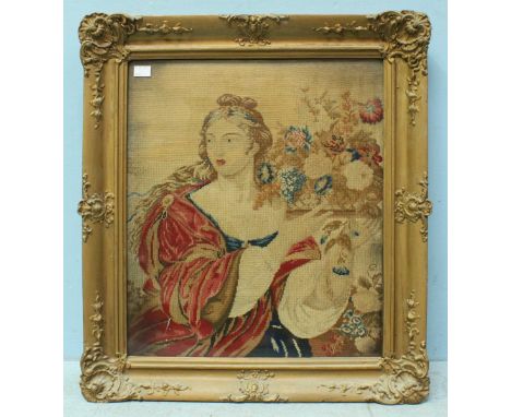 A 19th century tapestry depicting a classical maiden with flowers. Glazed and framed. 56 x 47cm.