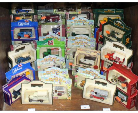 A collection of assorted boxed die-cast scale models by Lledo, including replica vehicles from television programmes includin