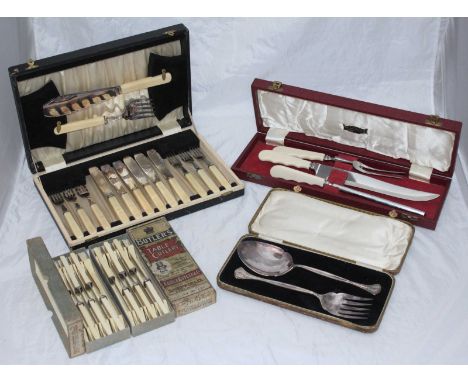 A Priestley & Moore Ltd carving set in original fitted case, together with a cased serving fork and spoon, a cased set of six