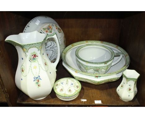 SECTION 33.  A five-piece Edwardian pottery wash set of jug, basin, toothbrush holder, soap dish and cover and chamber pot, t
