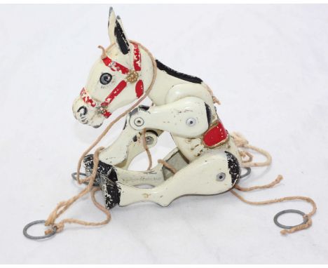 A Moko Lesney die-cast 'Muffin The Mule' metal finger puppet, stamped 'Made in England'