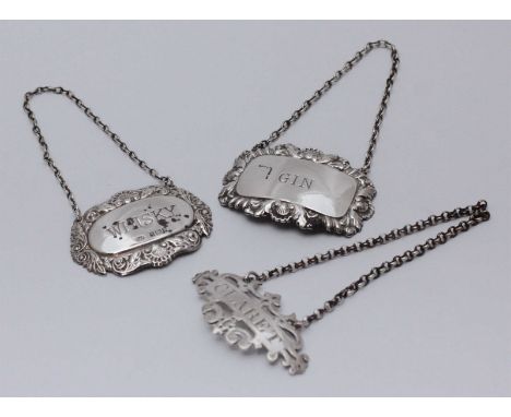 An early Victorian silver 'Claret' bottle ticket in the Gothic style by Charles Rawlings & William Summers, London, 1847, tog