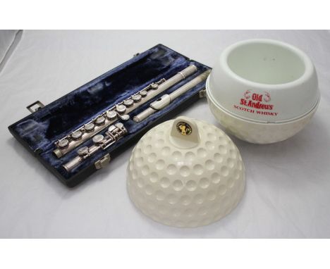 A novelty retro Old St Andrews Scotch Whisky cooler in the shape of a golf ball, together with a James Galway flute in black 