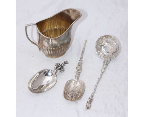 A silver Anointing spoon together with a Victorian silver caddy spoon, London 1889, maker 'DB,' together with a good quality 